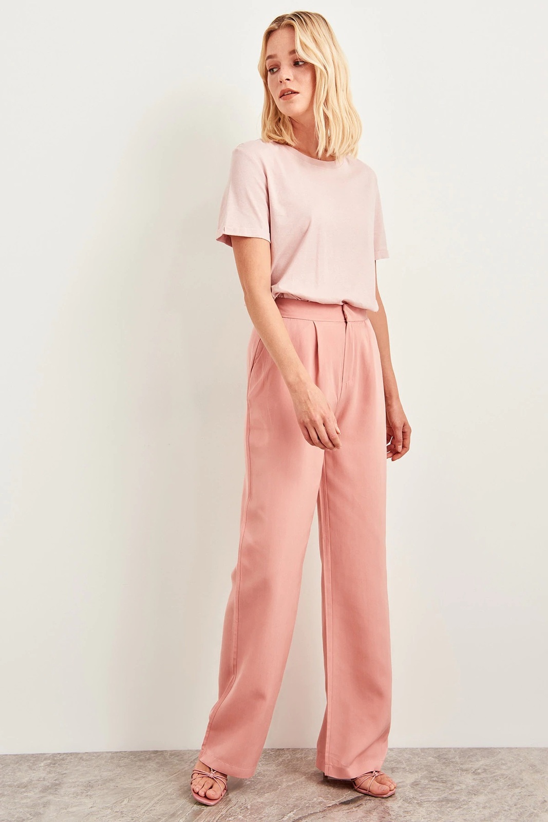 salmon pink trousers