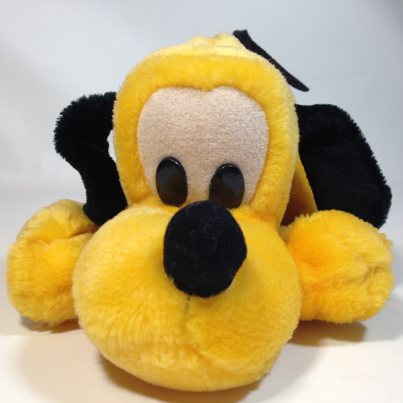 large pluto stuffed animal