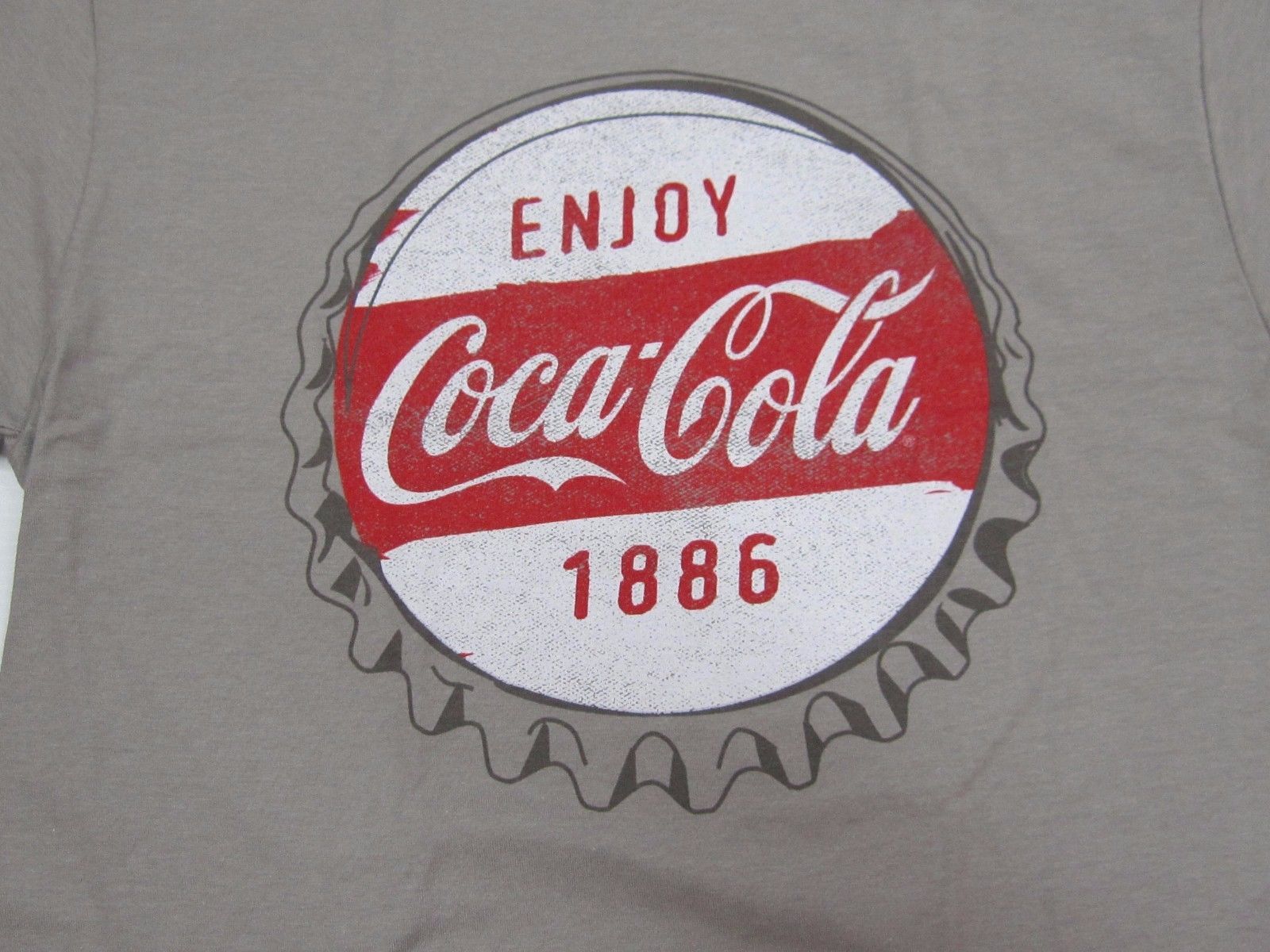 coca cola hats and shirts