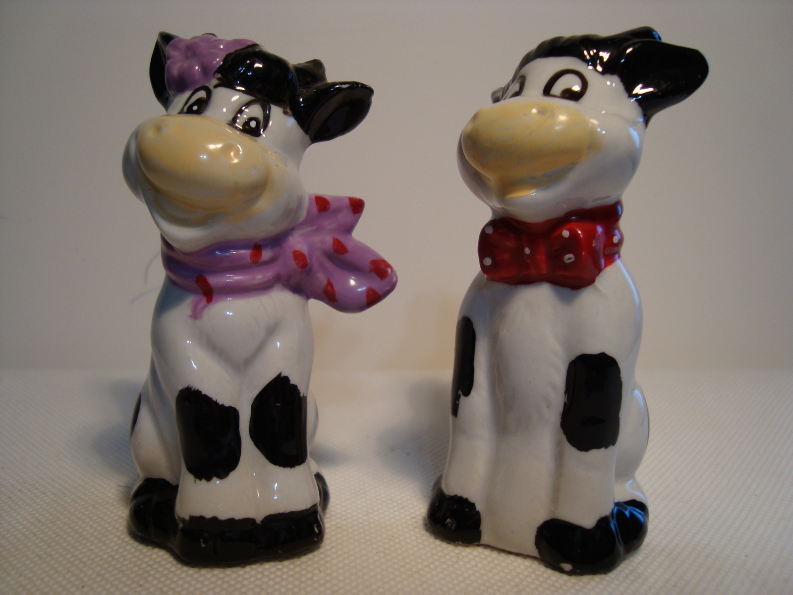 Primary image for Hand painted black & white boy and girl cow porcelain salt & pepper shaker set.