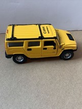 Maisto Hummer H2 1:46 scale Yellow - Diecast Pull Back Toy - Canon Transform 06 - $9.41