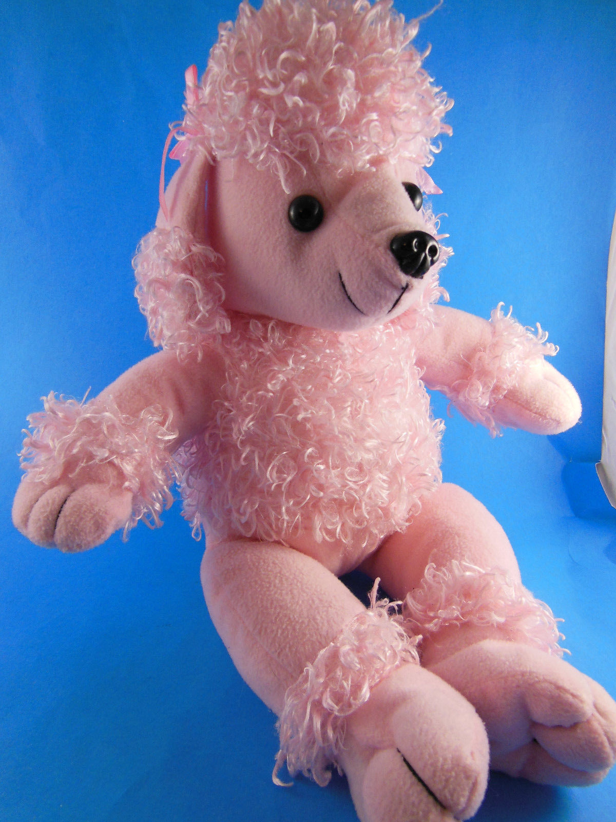 large pink poodle stuffed animal