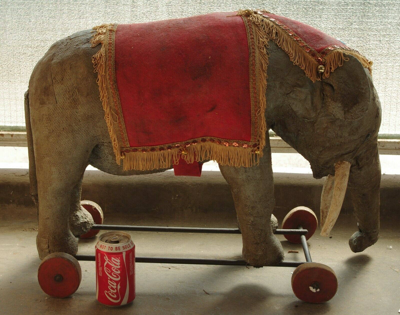 1910 stuffed elephant on wheels