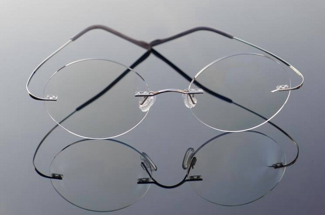 Round rimless spectacles