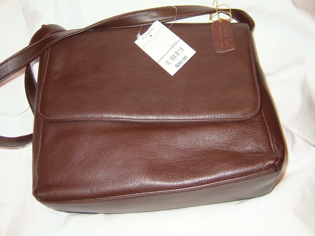 Purse in brown leather new with tags shoulder strape style J C Penney
