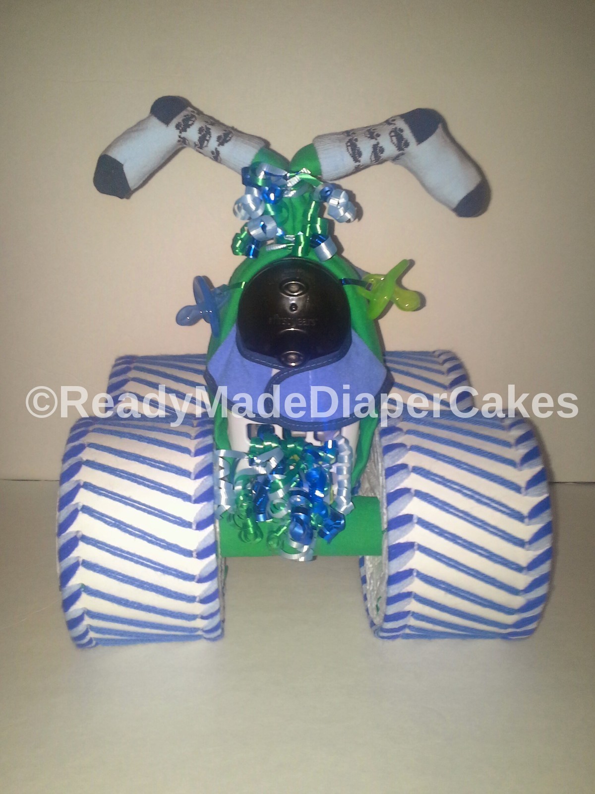 Blue  and Green Themed Baby Shower Four Wheeler Diaper Cake Table Centerpiece