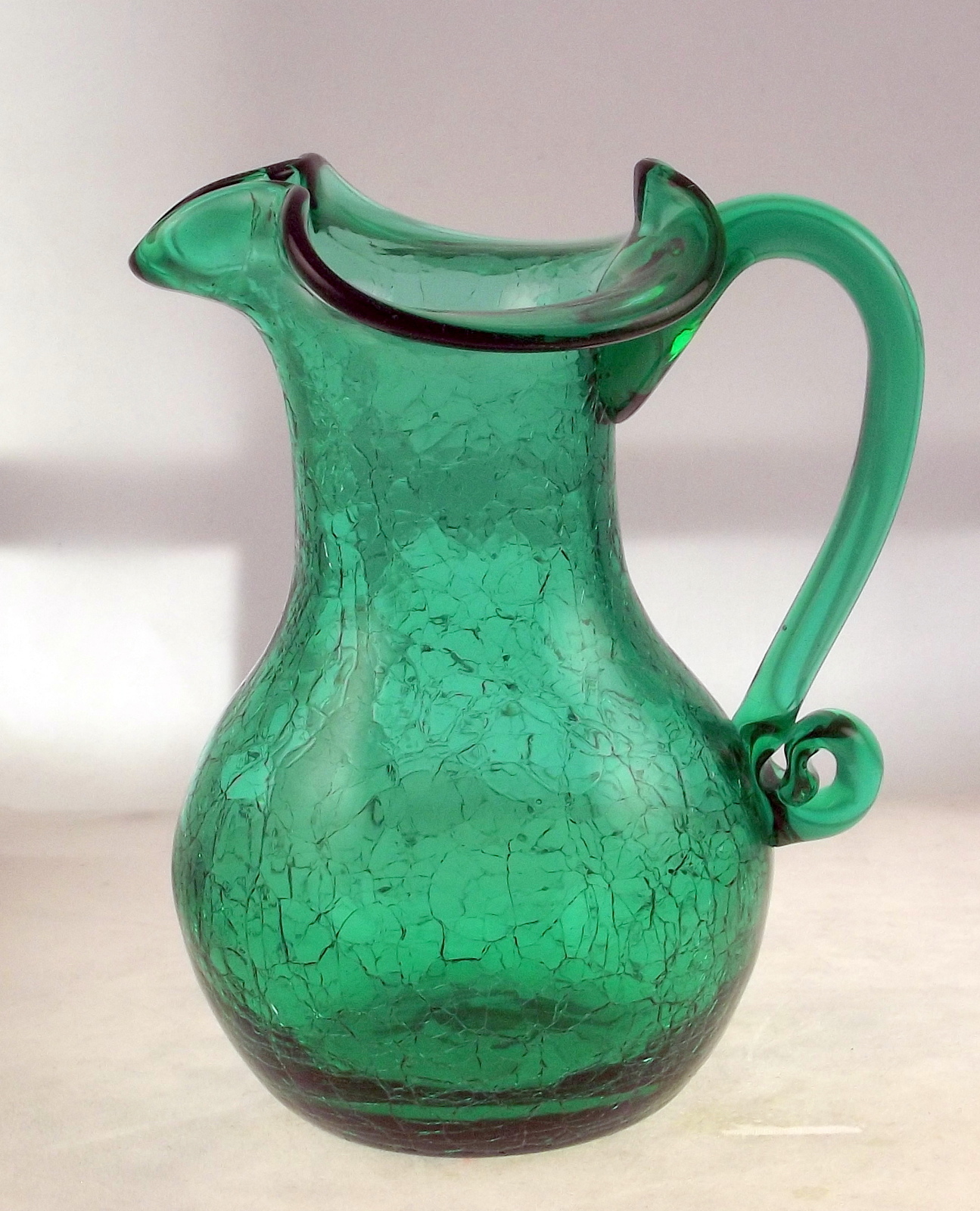Green glass pitcher vintage