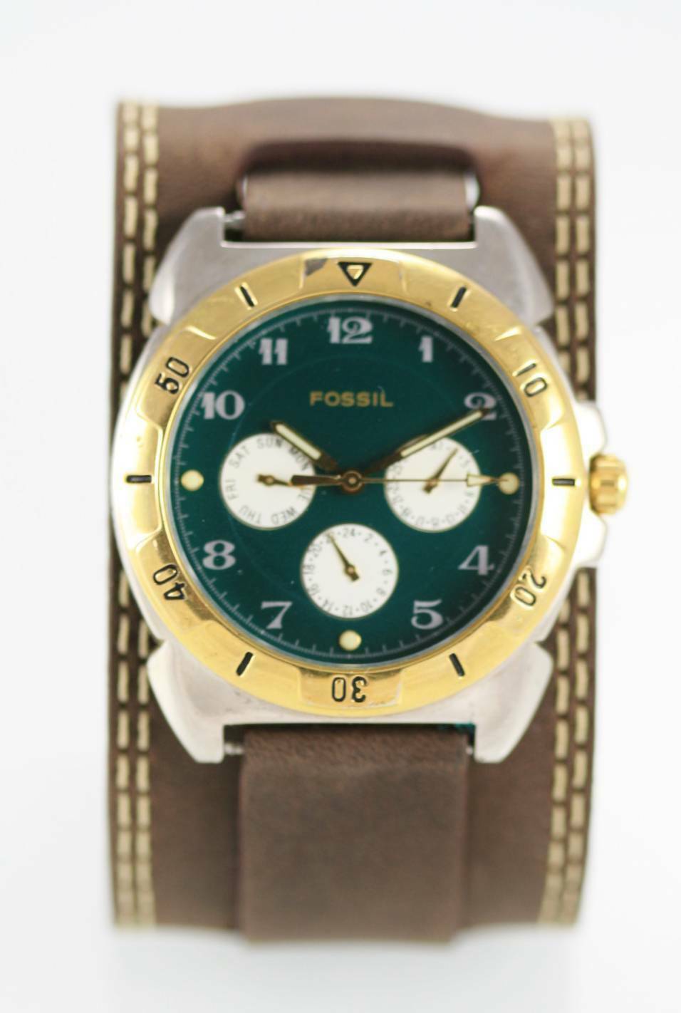 gold and silver fossil watch men's