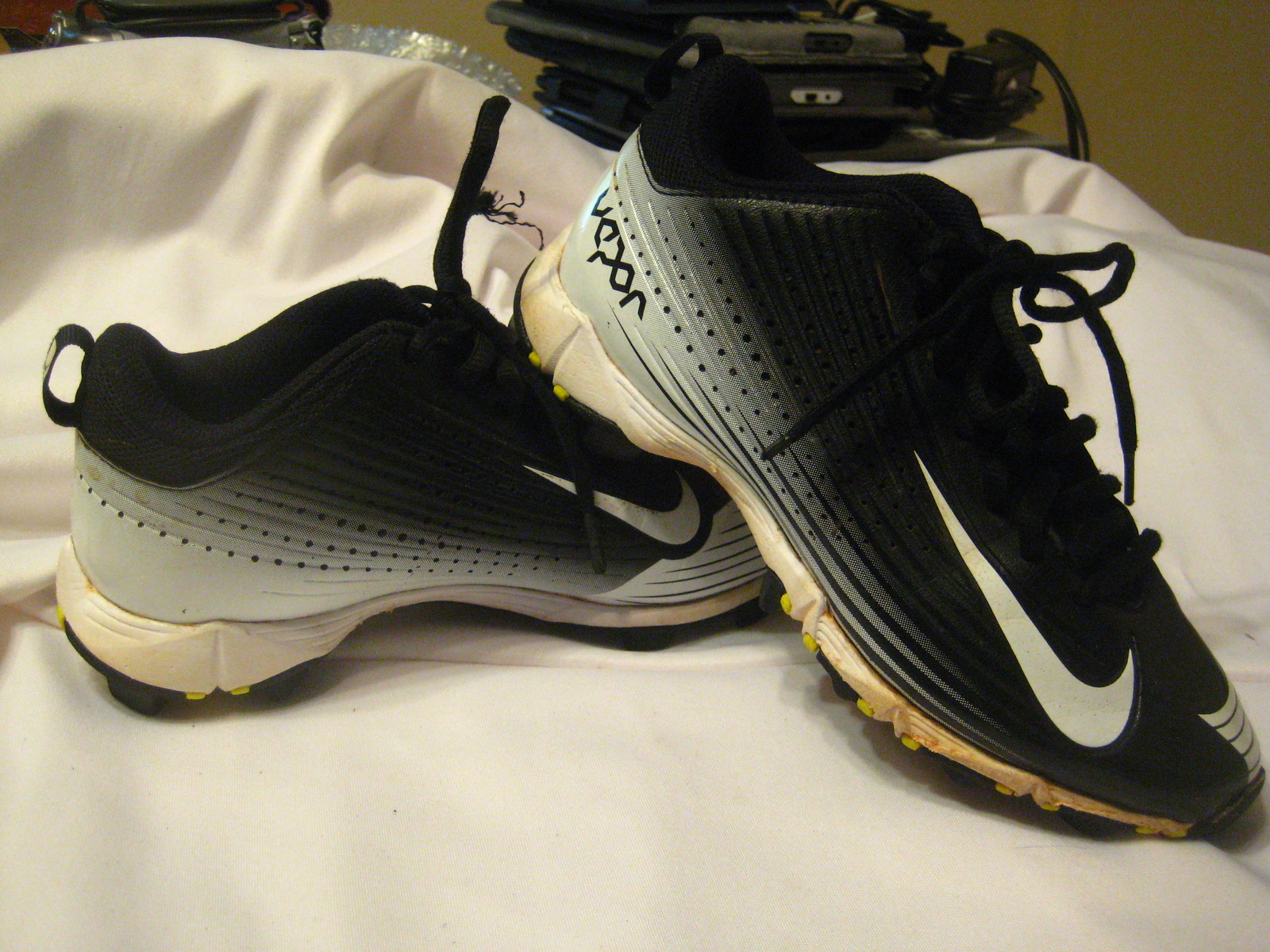 black and white vapor cleats