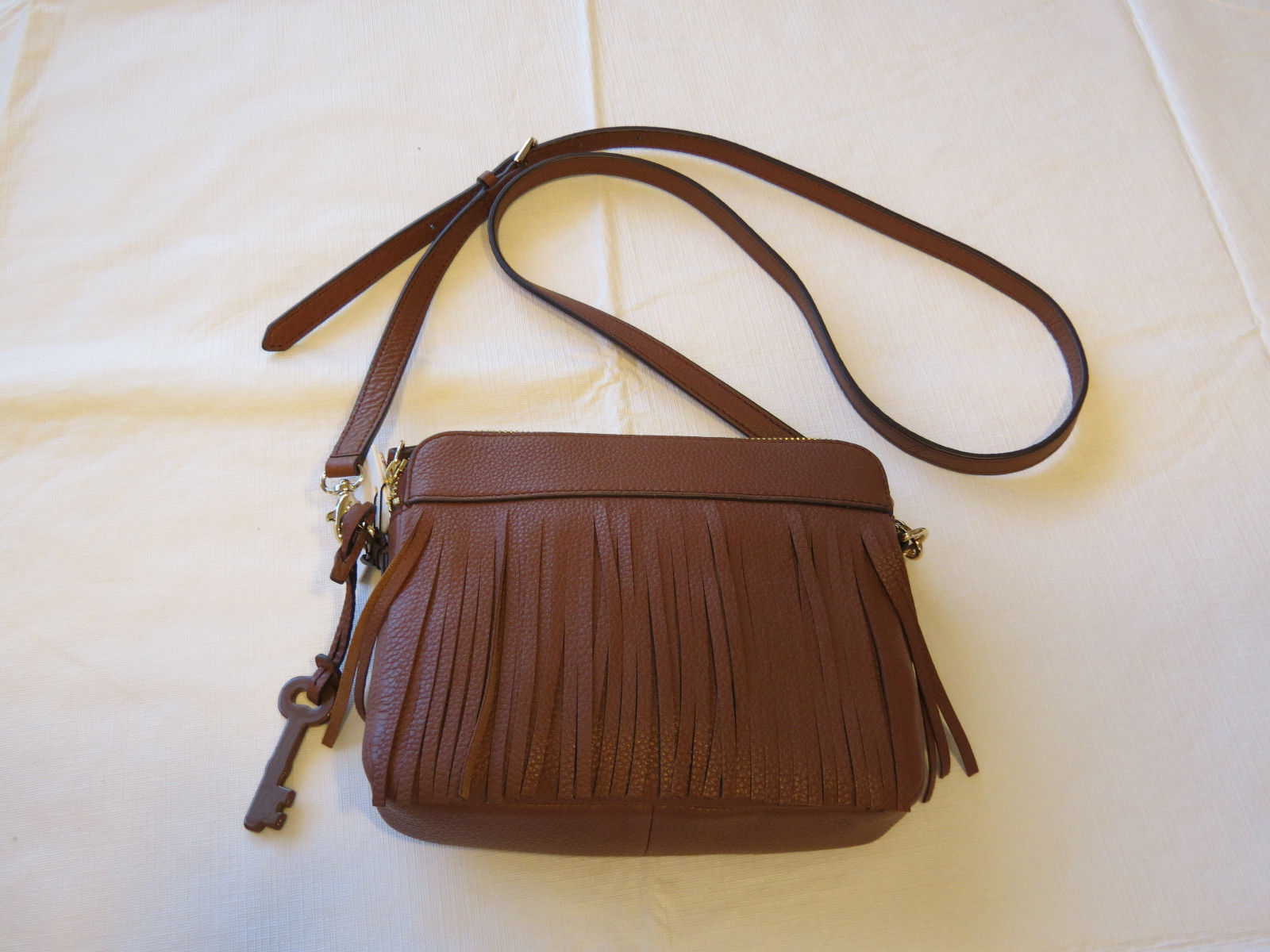 fossil fringe purse