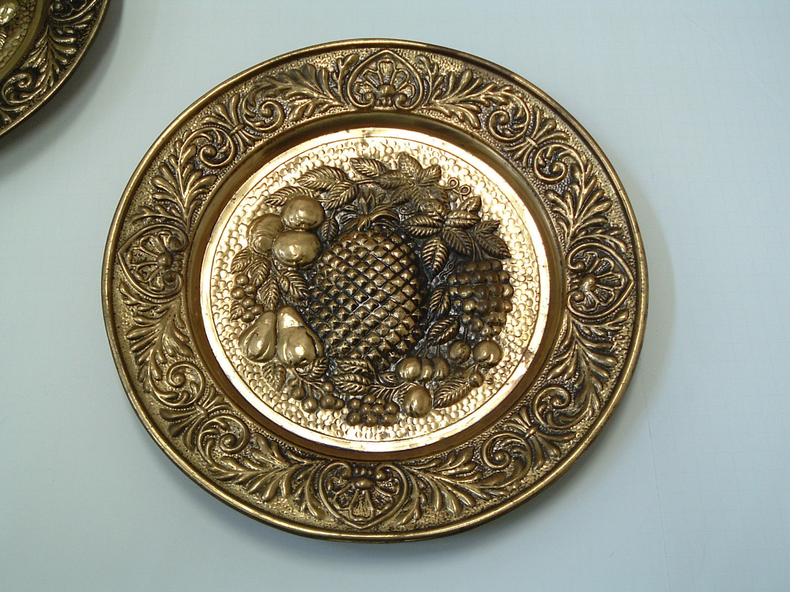 Vintage round metal gold embossed stamped fruit decor