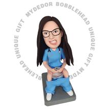Female doctor squatting on the toilet Custom BOBBLEHEAD - $74.47+