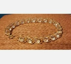 Avon Tennis Bracelet Goldtone W/ Crystal Design - $23.75