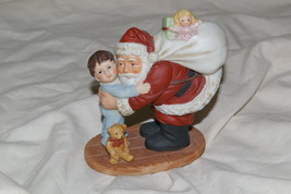 Homco Santa Hugging Boy Figurine 5261 Home Interiors - $10.00