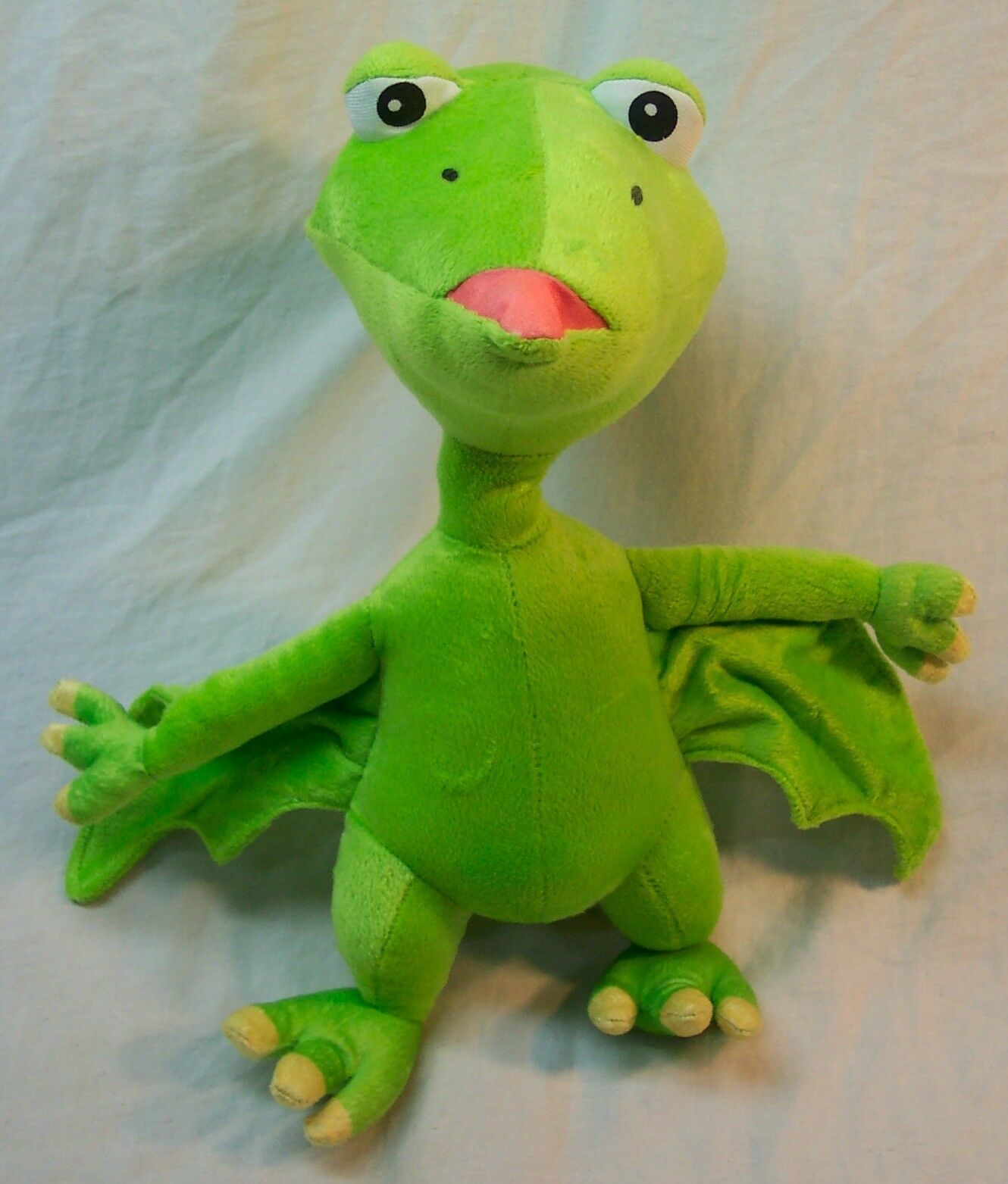 green dinosaur plush