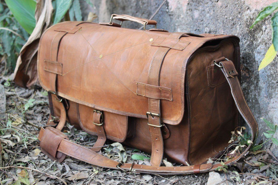 vintage brown leather duffle bag