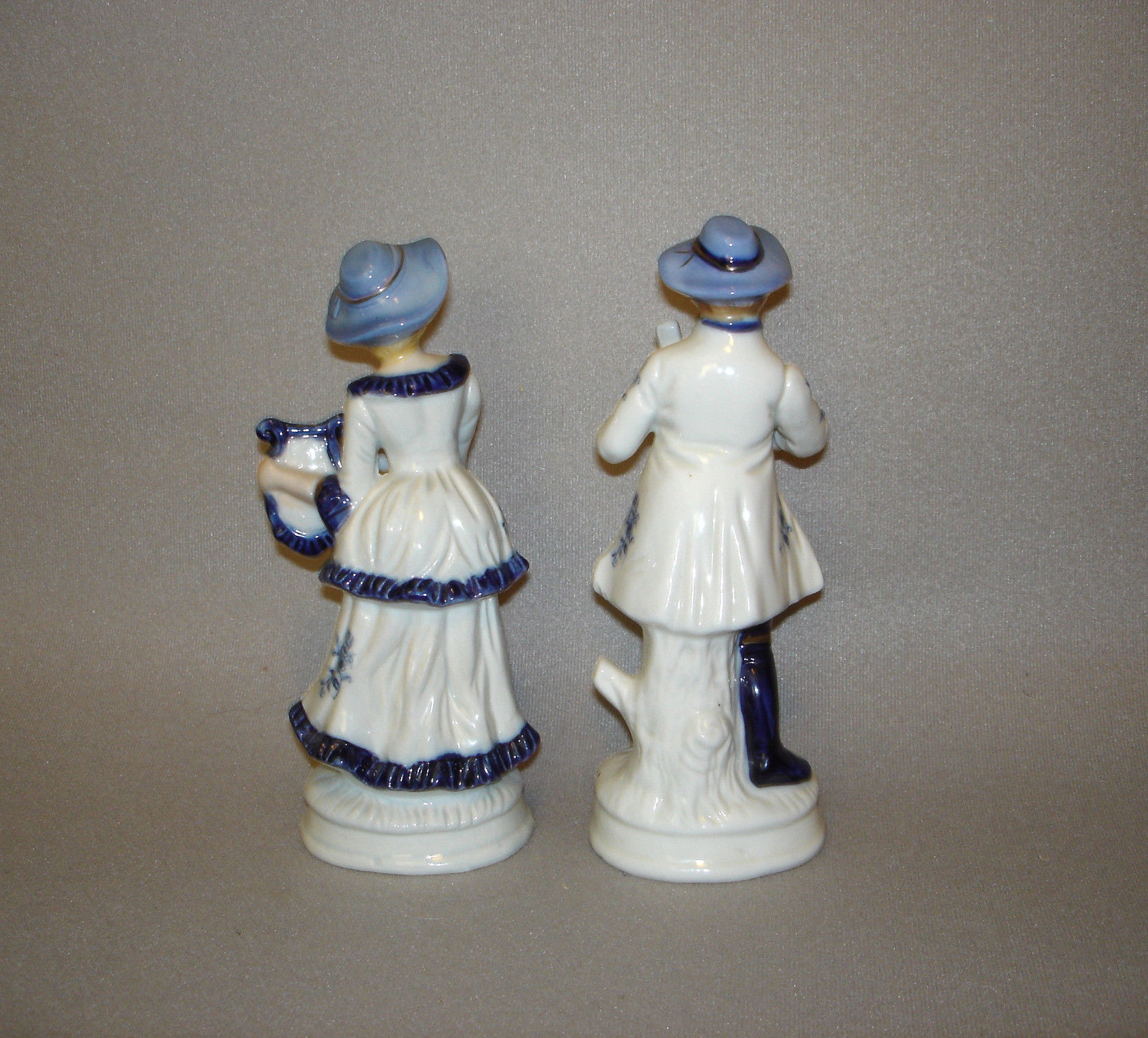 antique colonial figurines