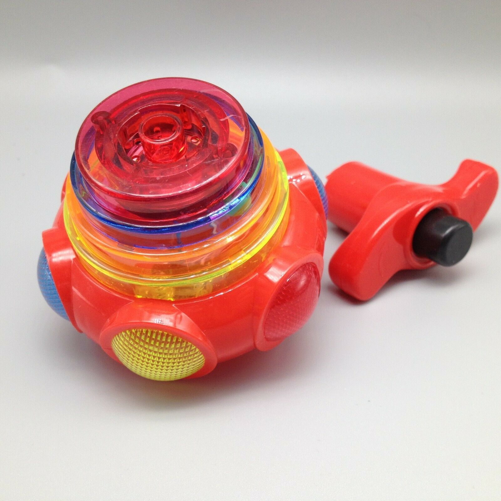 Light Up Musical Spinning UFO Top Flashing Toy Gyro Red Color