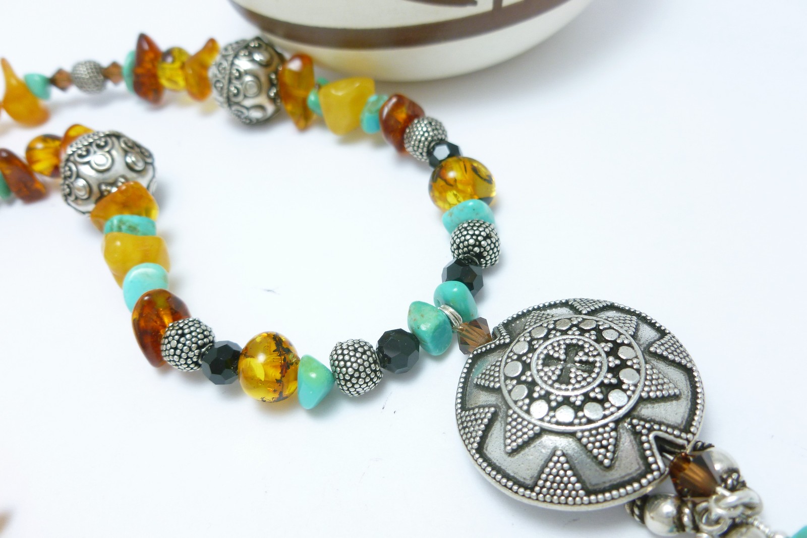 https://m.bonanza.com/listings/Turquoise-and-Amber-Nugget-Gemstones-Bali-Sterling-Beaded-Necklace/226714346