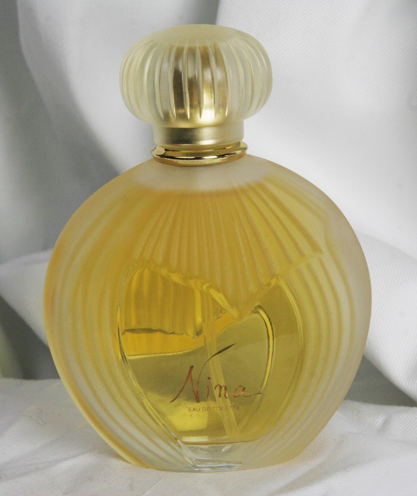 Nina by Nina Ricci 75 ml / 2.5 oz edt spray Lalique Vintage Bottle