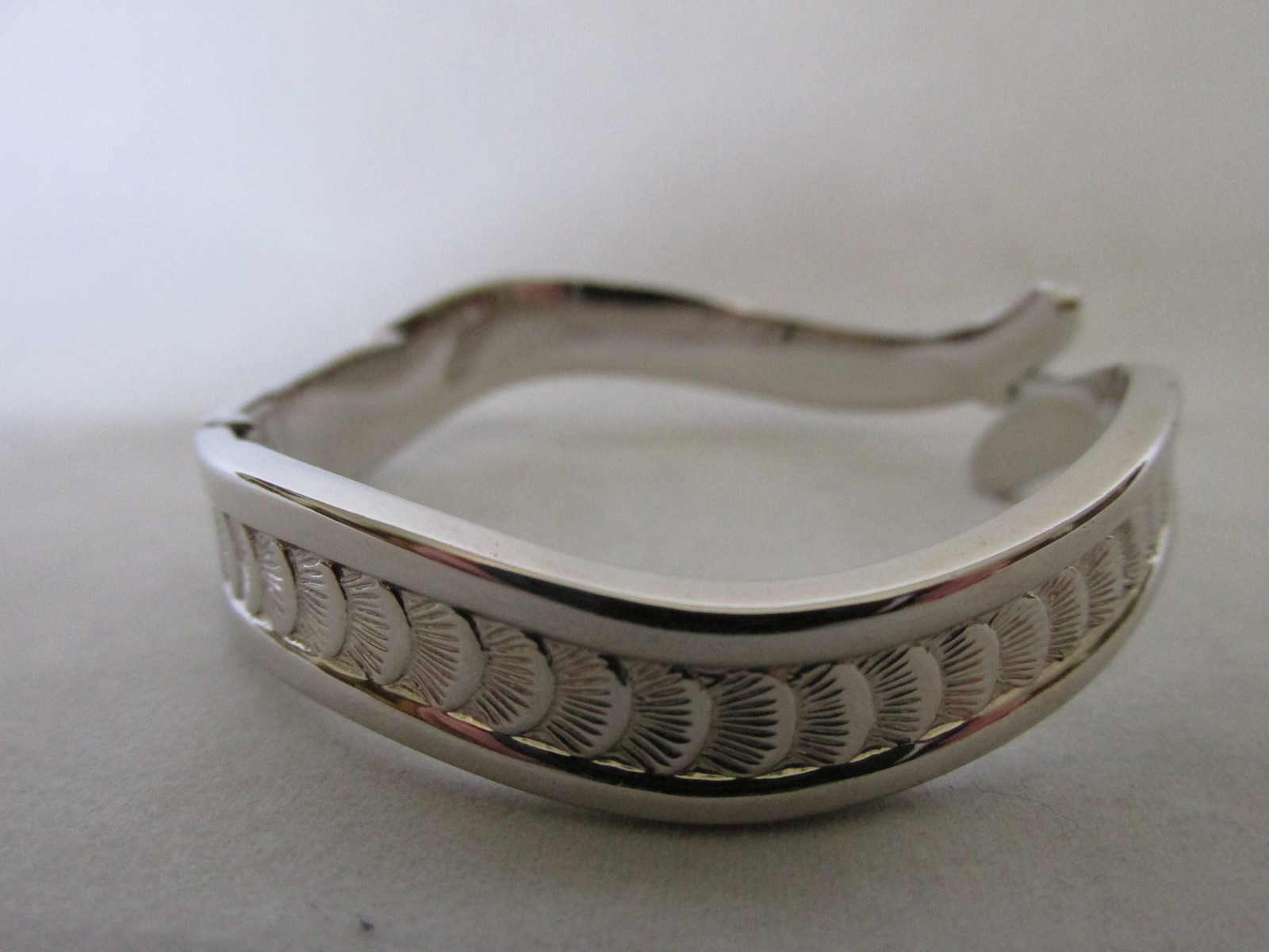 Silver Toned Hinged Cuff Bracelet with Seashell Design Bracelets