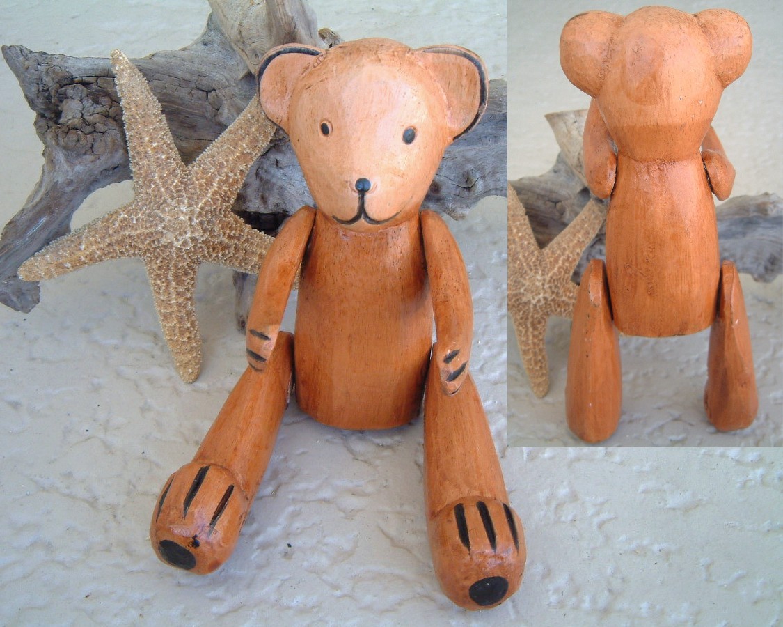 stuffed bears with wooden faces