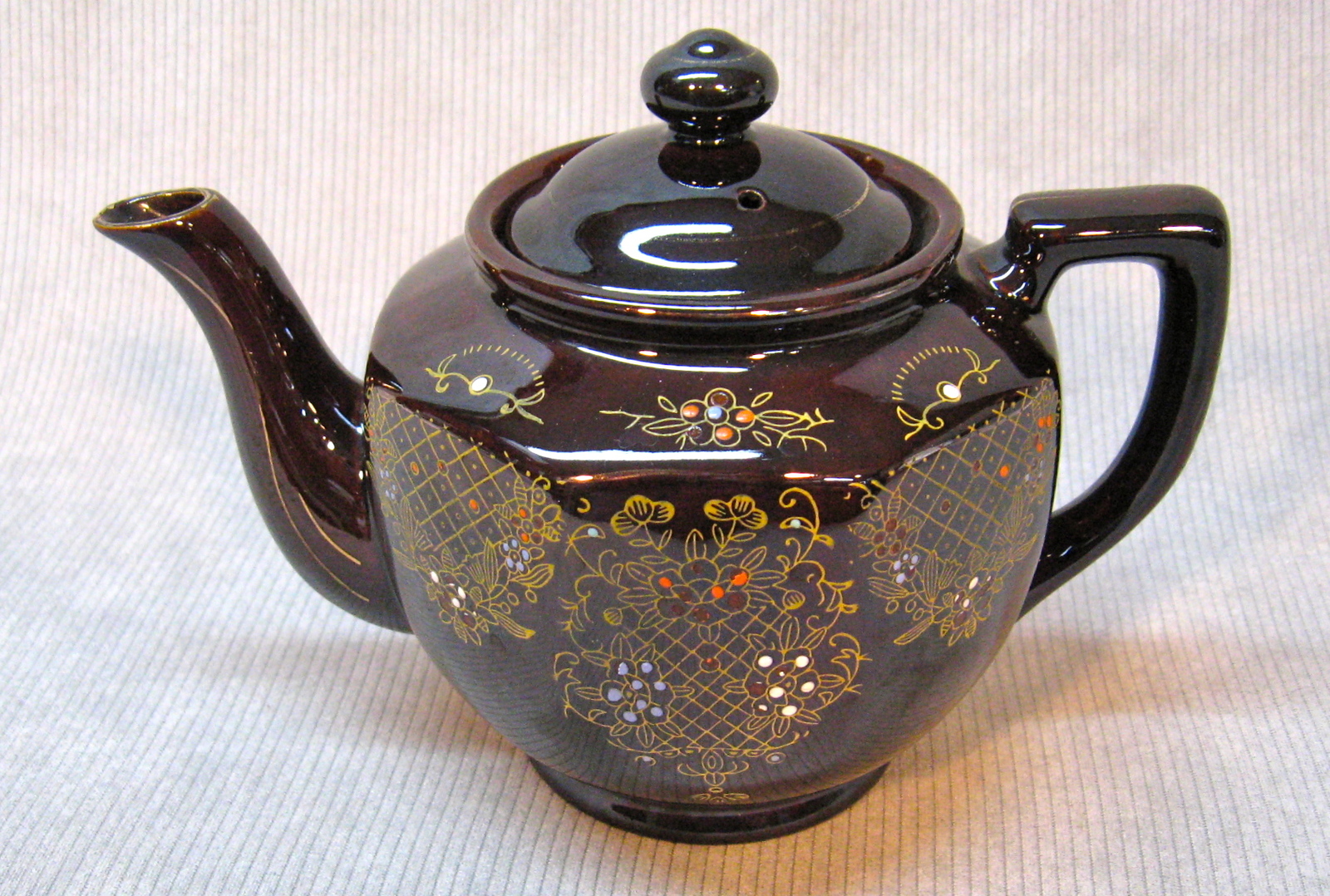 Ceramic hand painted Tea pot,"Acme Japan" on bottom, wear on lid Gold