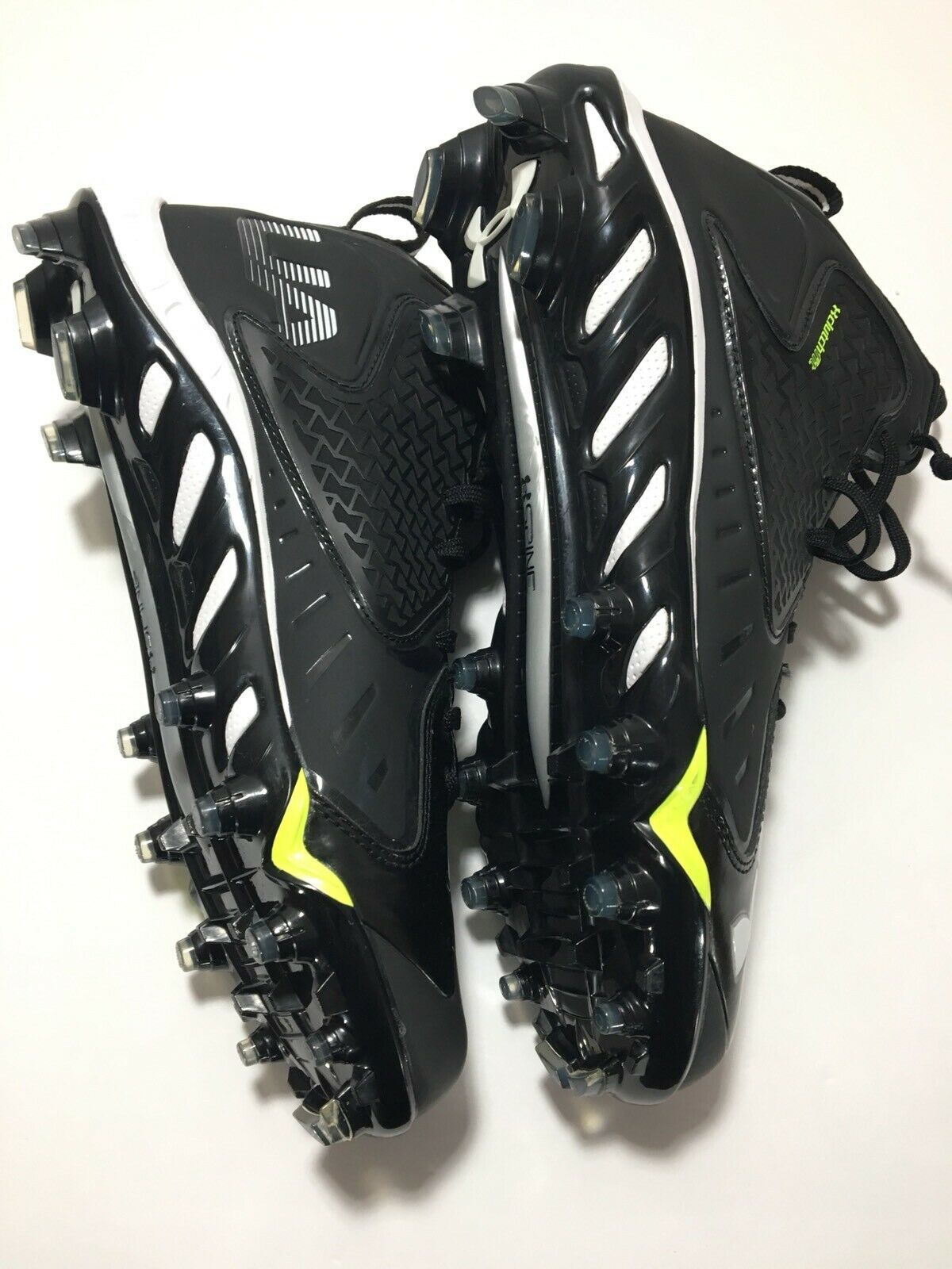 all black under armour cleats