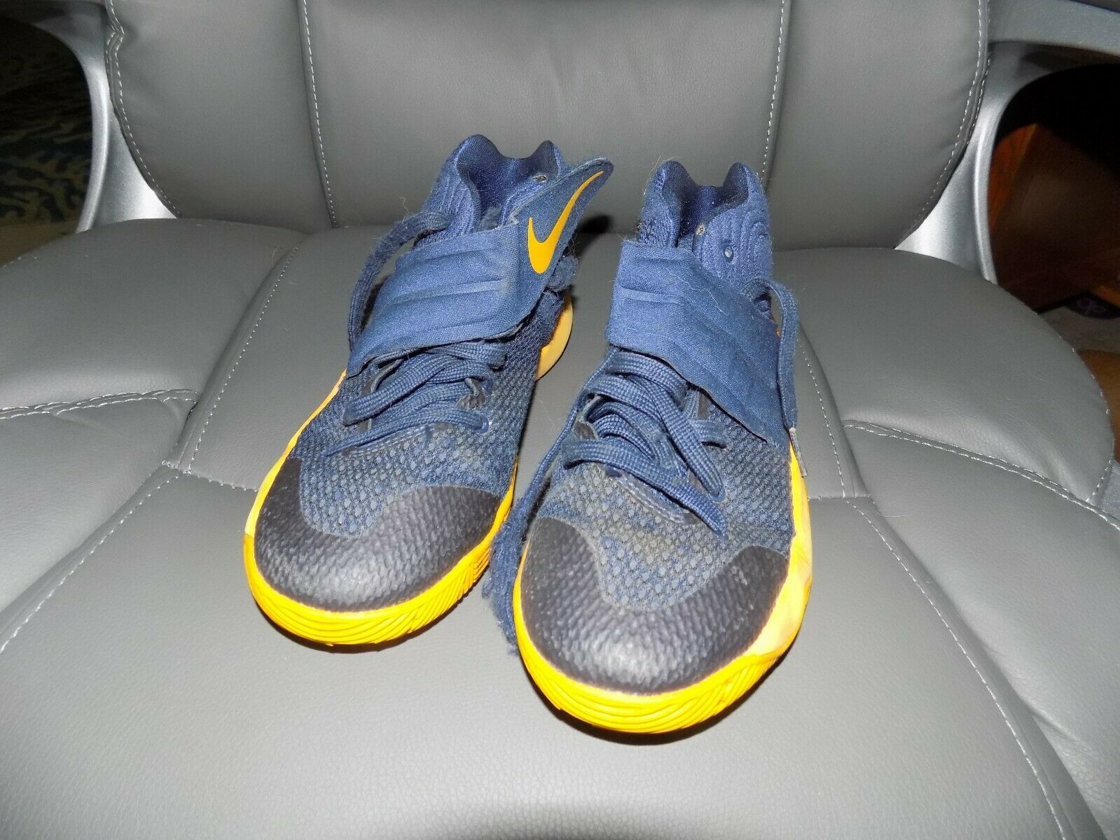 grey and gold basketball shoes