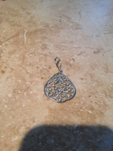 beautiful lace like metal pendant - $19.99