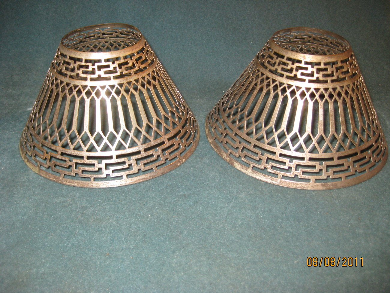 Pair of Pierced metal candle lamp shades Lamps