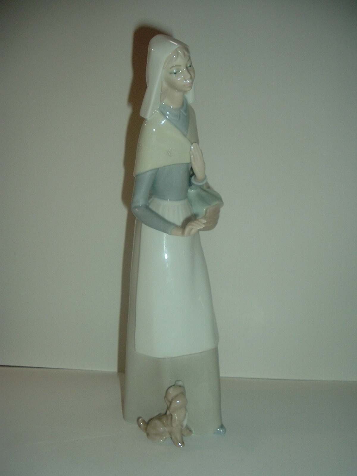 lladro woman with sheep