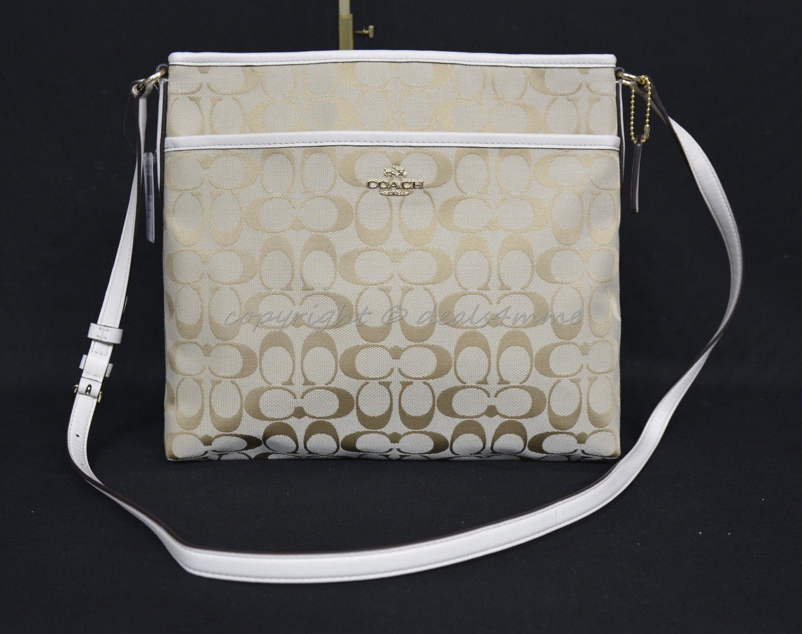 cream colored coach bag
