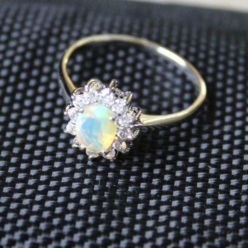 Sterling Silver Ethiopian Opal Engagement Ring 5x7 mm oval Opal Solitaire Ring