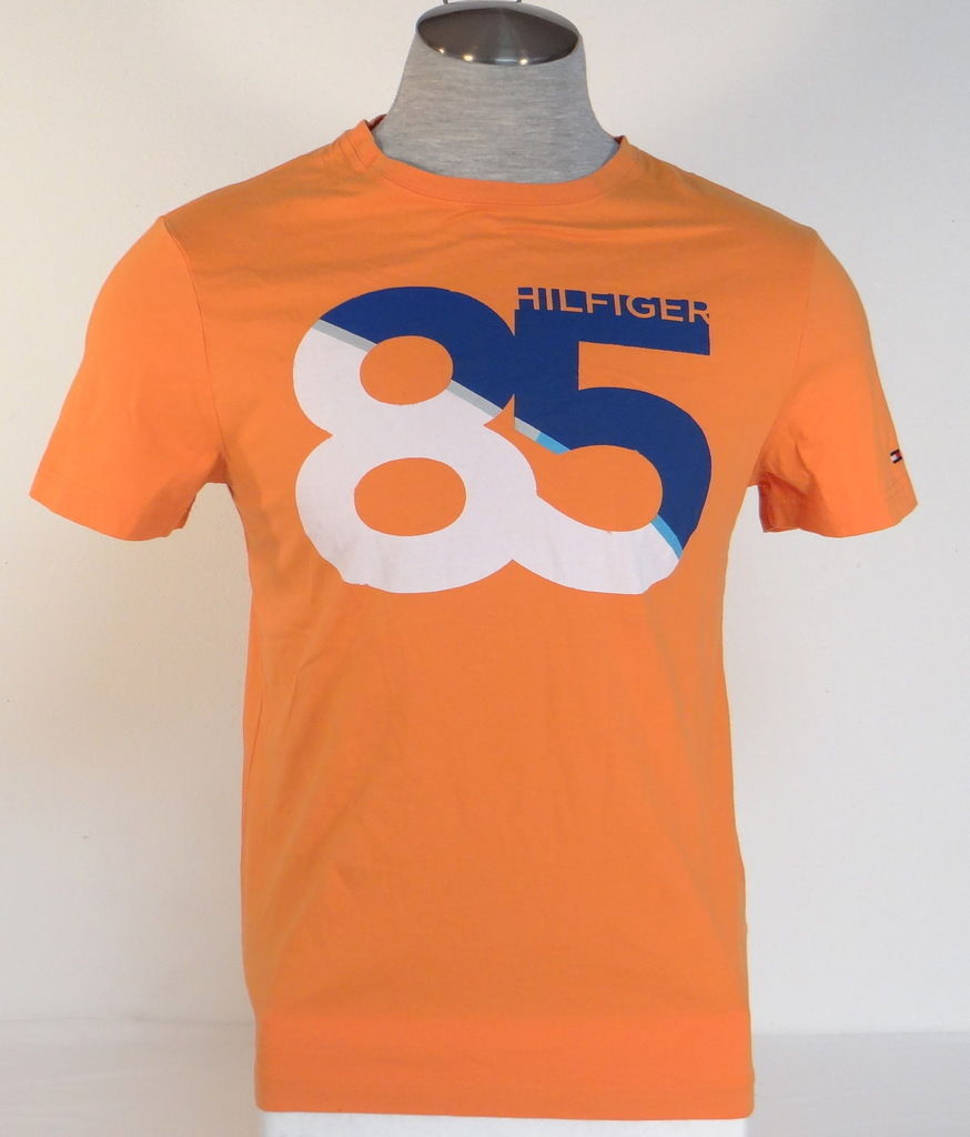 beige and orange graphic tee