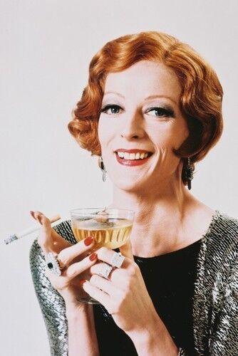 Maggie Smith 11x17 Mini Poster holding cocktail and smoking cigarette