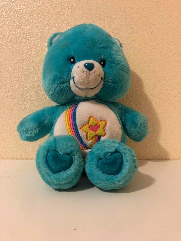 small stuffed care bears