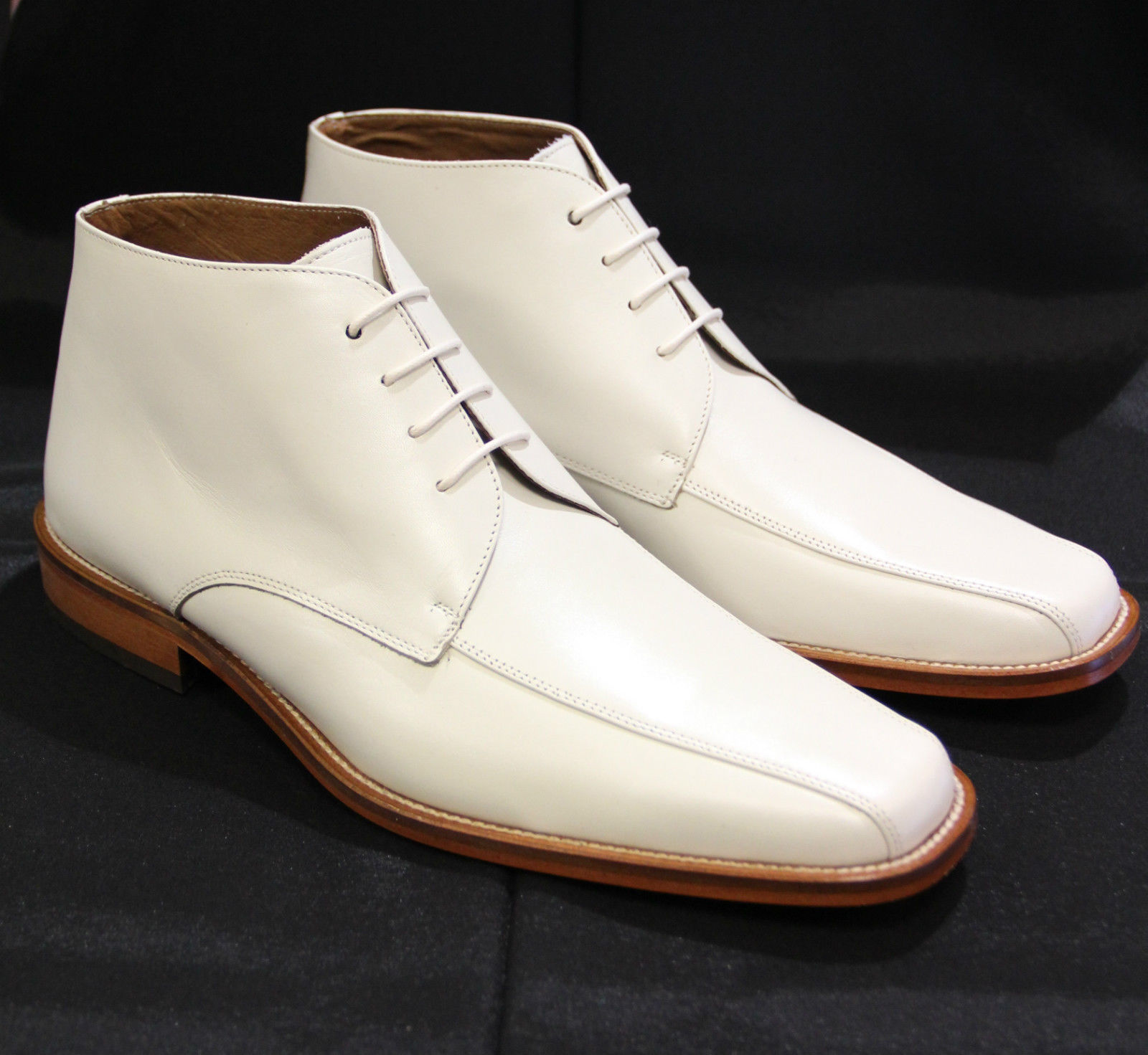 men wearing white boots