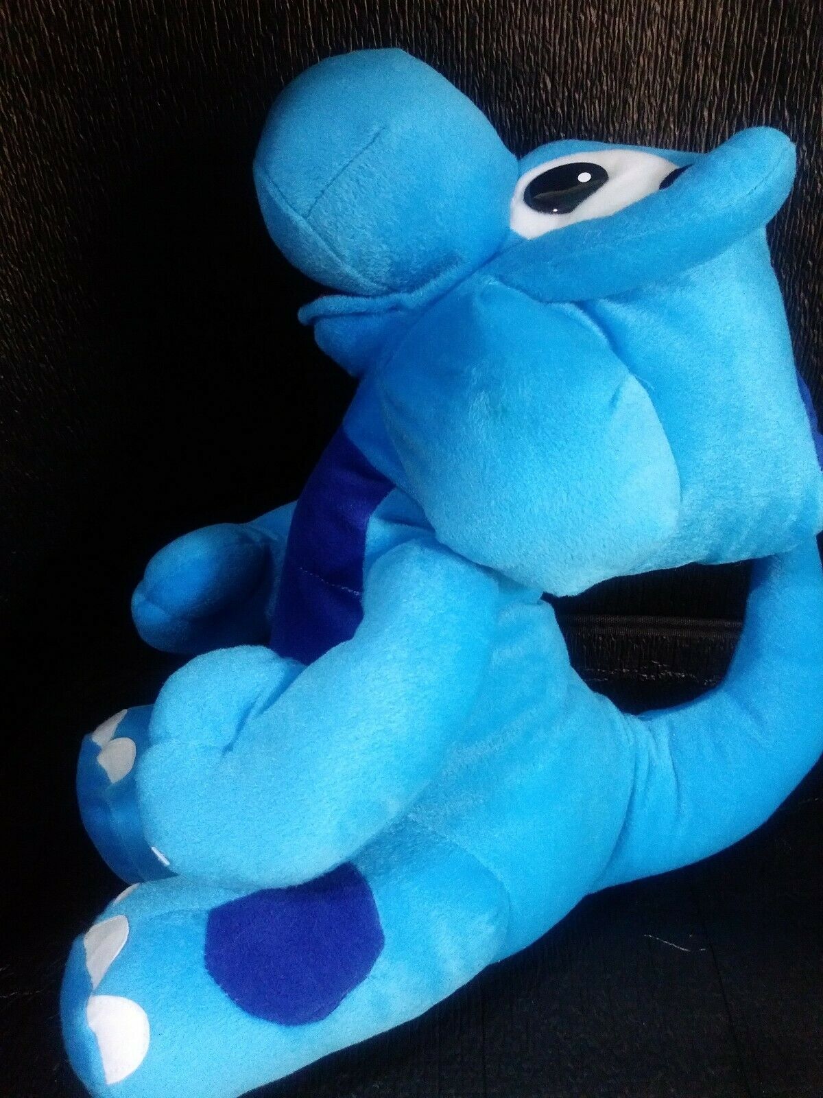 blue dinosaur plush toy