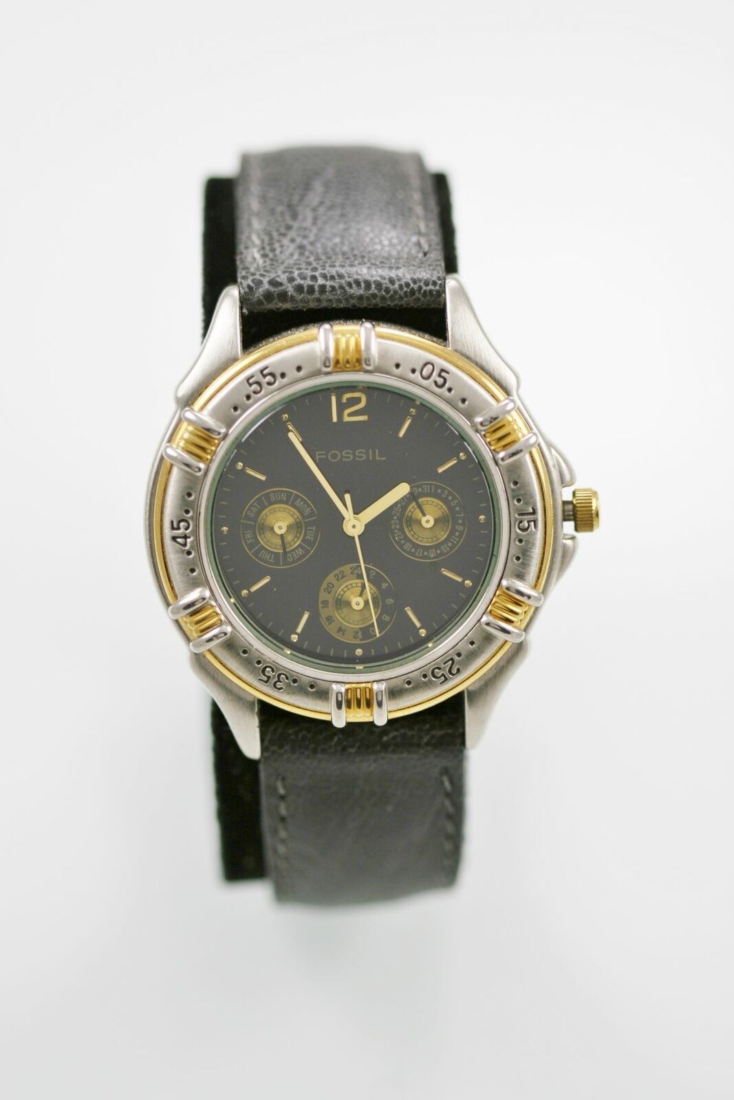 gold and silver fossil watch men's