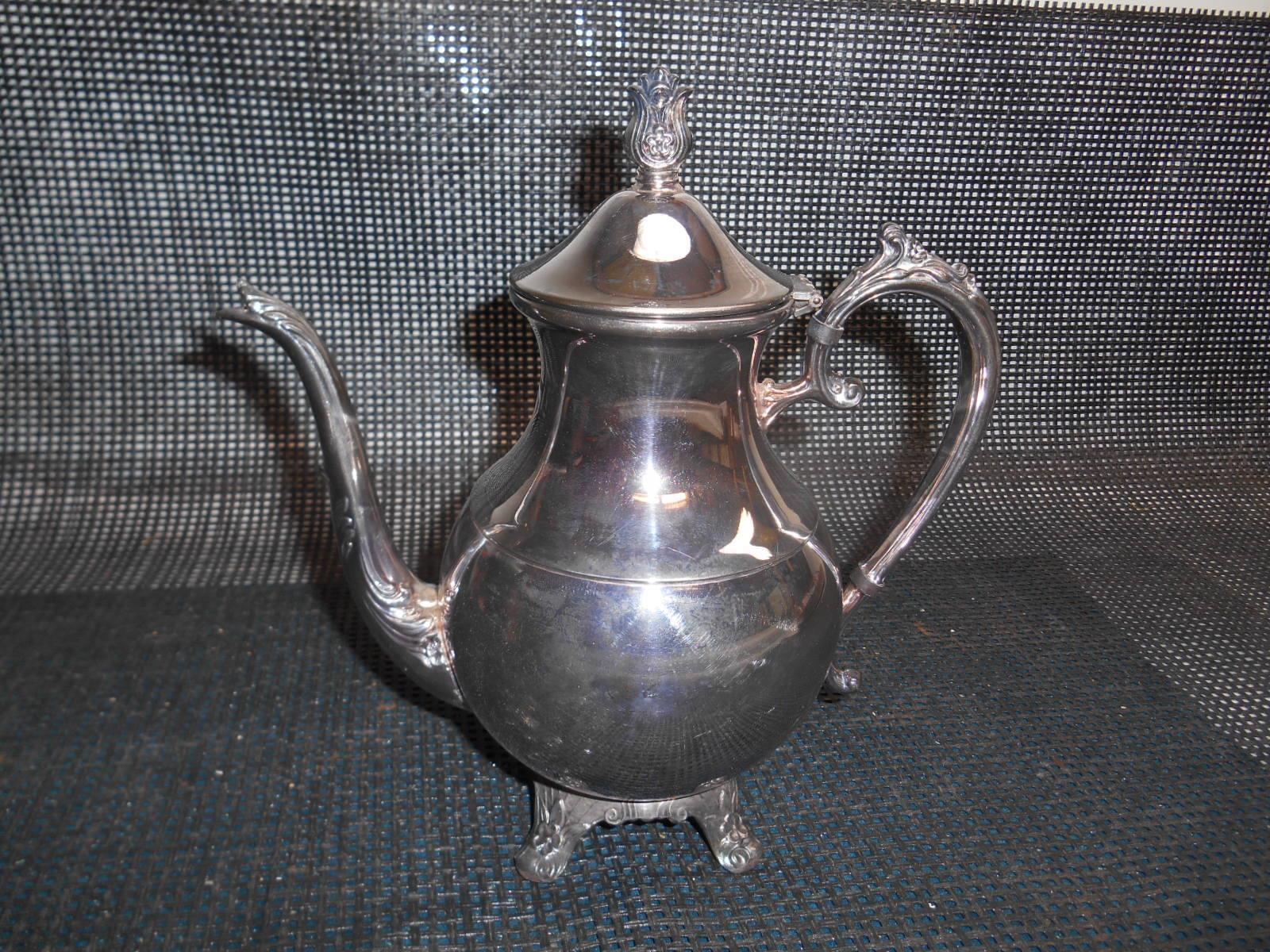 Wm A Rogers Silver Plated Copper Coffee Pot.