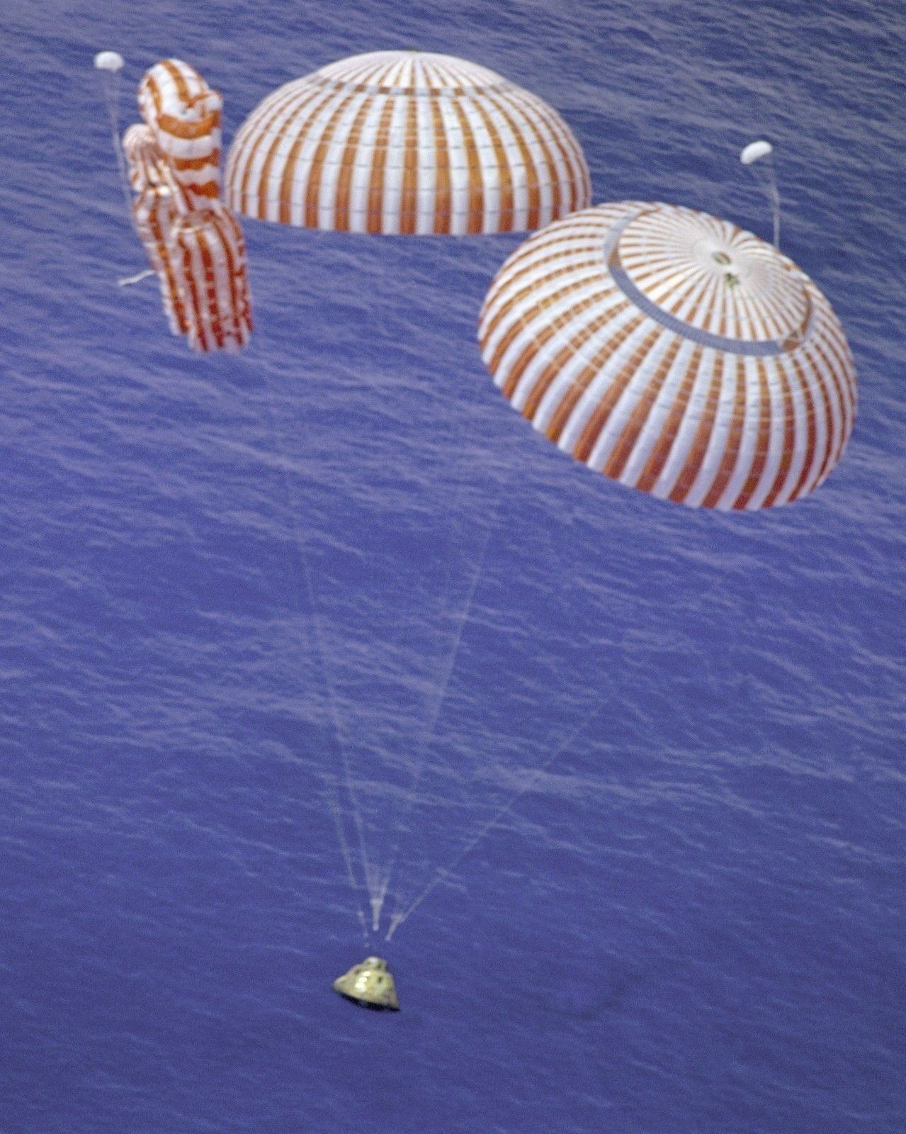 Apollo 15 Command Module splashdown with one failed parachute Photo ...