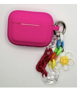 Hot pink earphone case with wristlet charm detail - $12.00