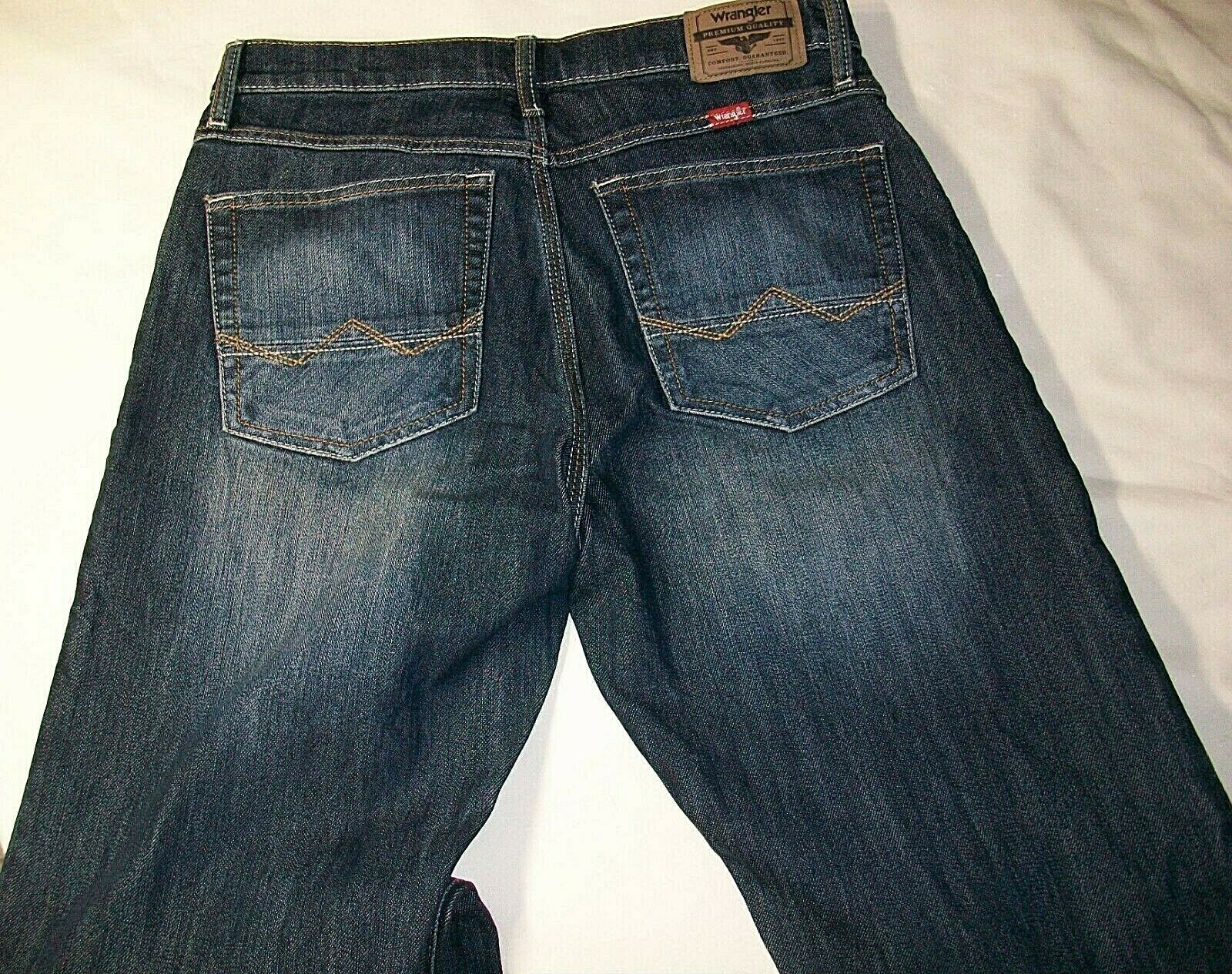 Wrangler Men's Relaxed Boot Cut Blue Denim Jeans Sits Low Flex Comfort ...