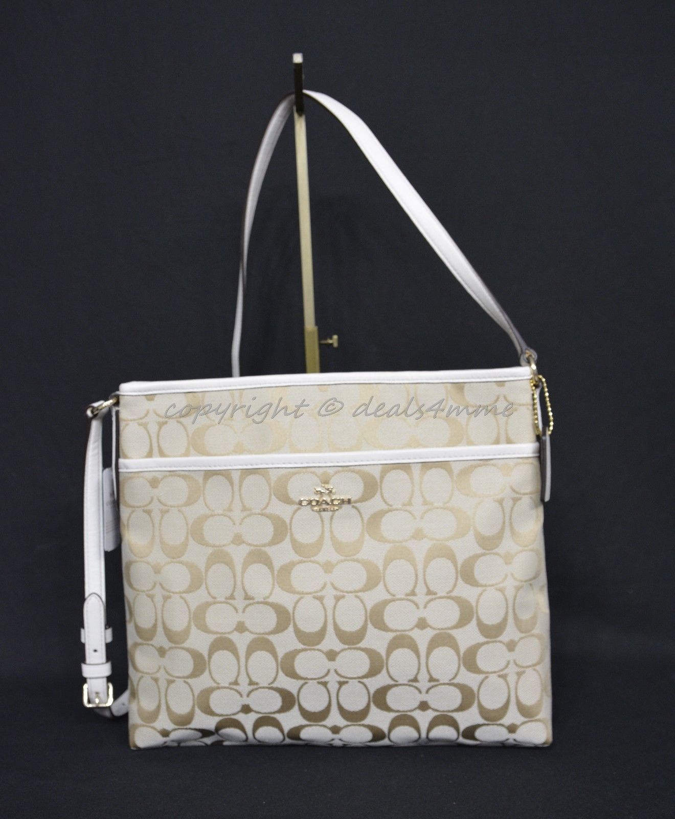 cream colored coach bag
