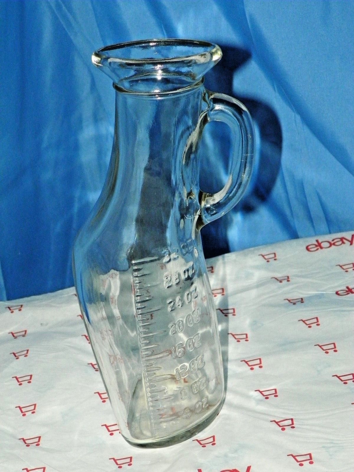 GLASCO GLASS HOSPITAL UNISEX URINAL BOTTLE WITH OFFSET HANDLE EMBOSSED