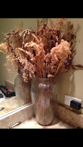 Glass vase with dried flowers  - $49.99