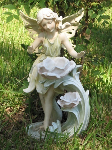 fairy feeder statue