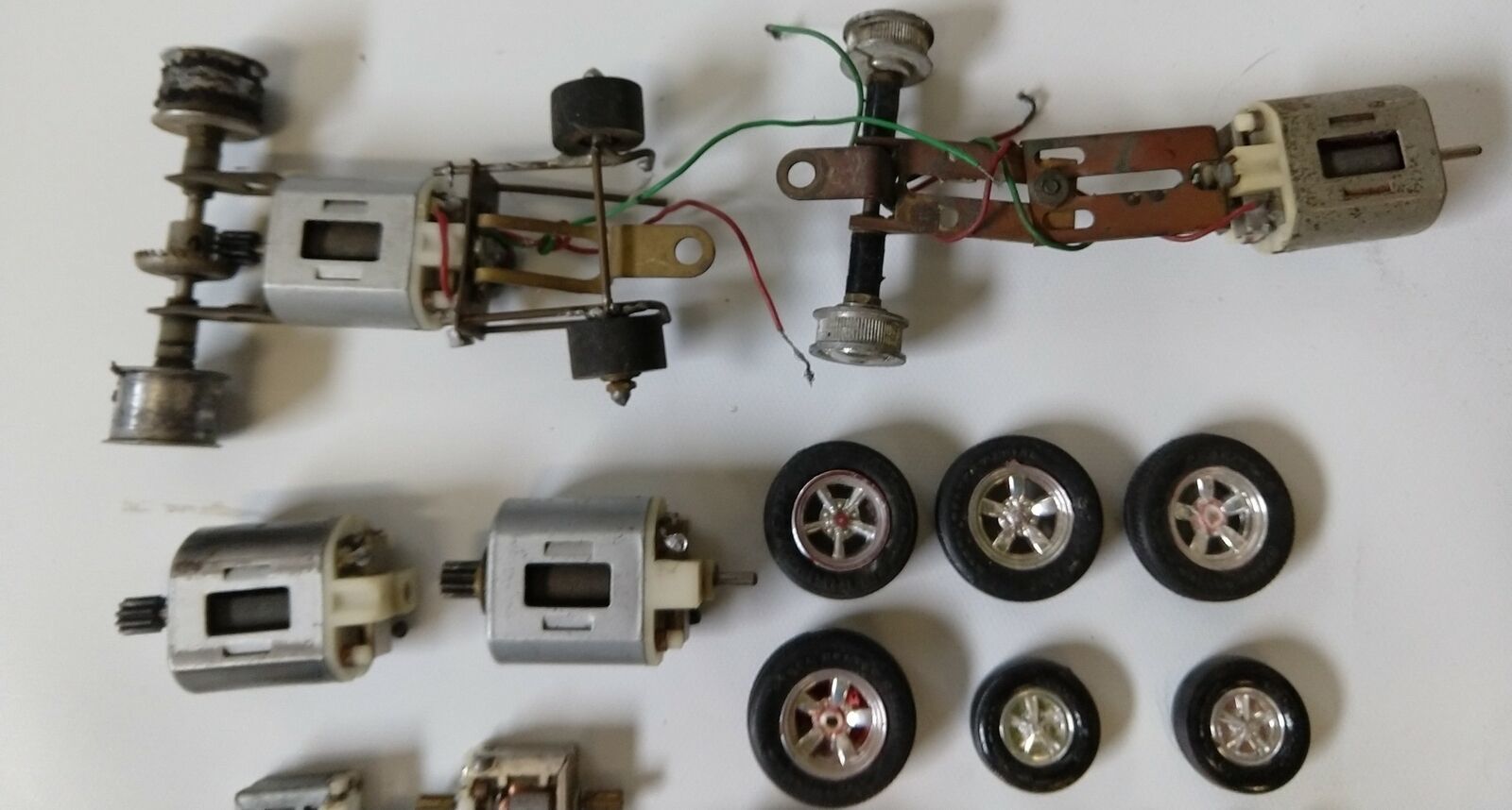 Lot of 30 Slot car parts 124 and 132 scale. Great for