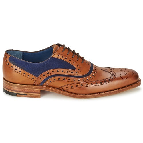 brown and blue wingtip shoes